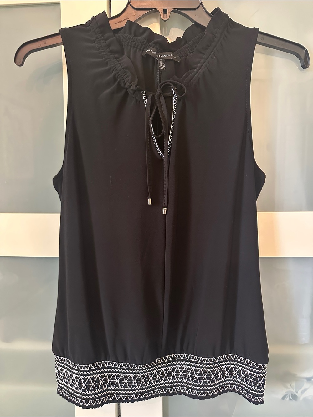 White House Black Market Black Sleeveless Tie-Neck Top with Embroidered Hem